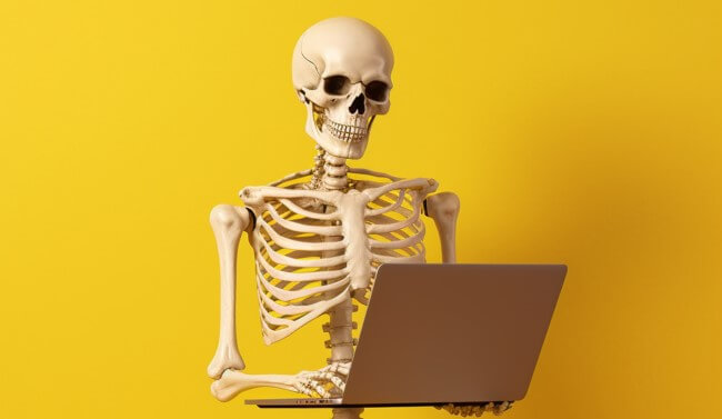 Halloween skeleton making a quiz
