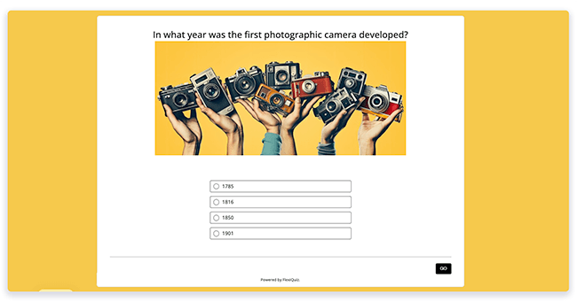 image on quiz yellow background with hands holding cameras