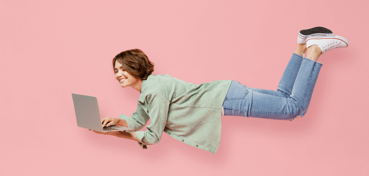 Woman setting quiz automation on her laptop